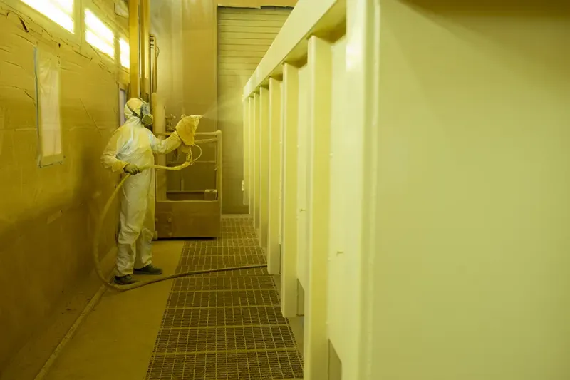 Application en cabine de peinture pour la fabrication de matériel agricole